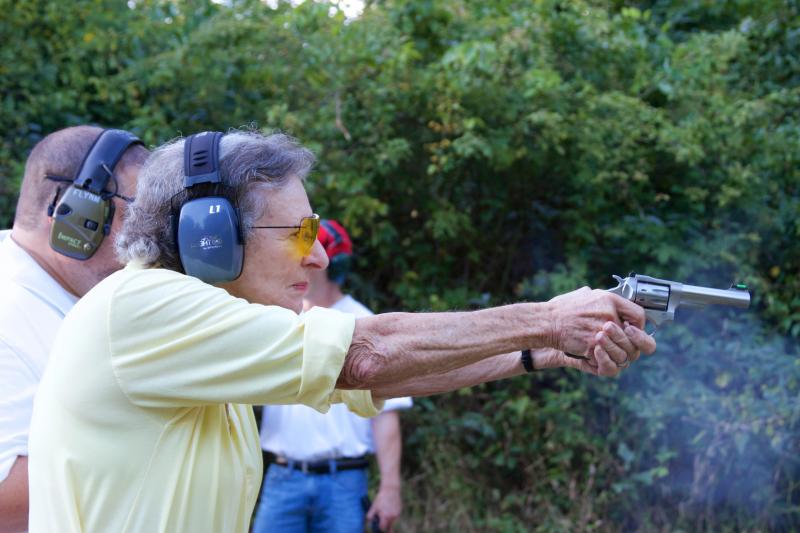 Cynthia Casner, 81, shoots a pistol at the NRA Women on Target program at the Sippican Rod & Gun Club. Casner and her daughter were one of three mother-daughter pairs at the gun safety and training program. BY GEORGIA SPARLING